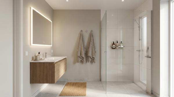 Weitwinkelbild eines Badezimmers mit LED-Spiegel, Klebehaken, Duschablage und aufgeräumter Wirkung.